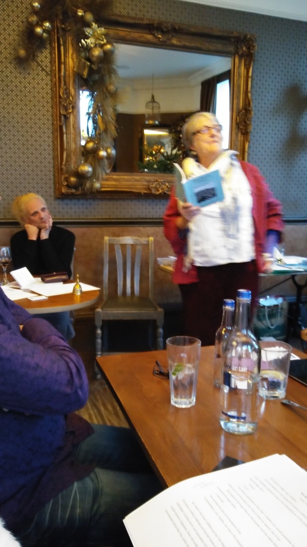 Gill James reading from her January Stones collection. Image by Allison Symes